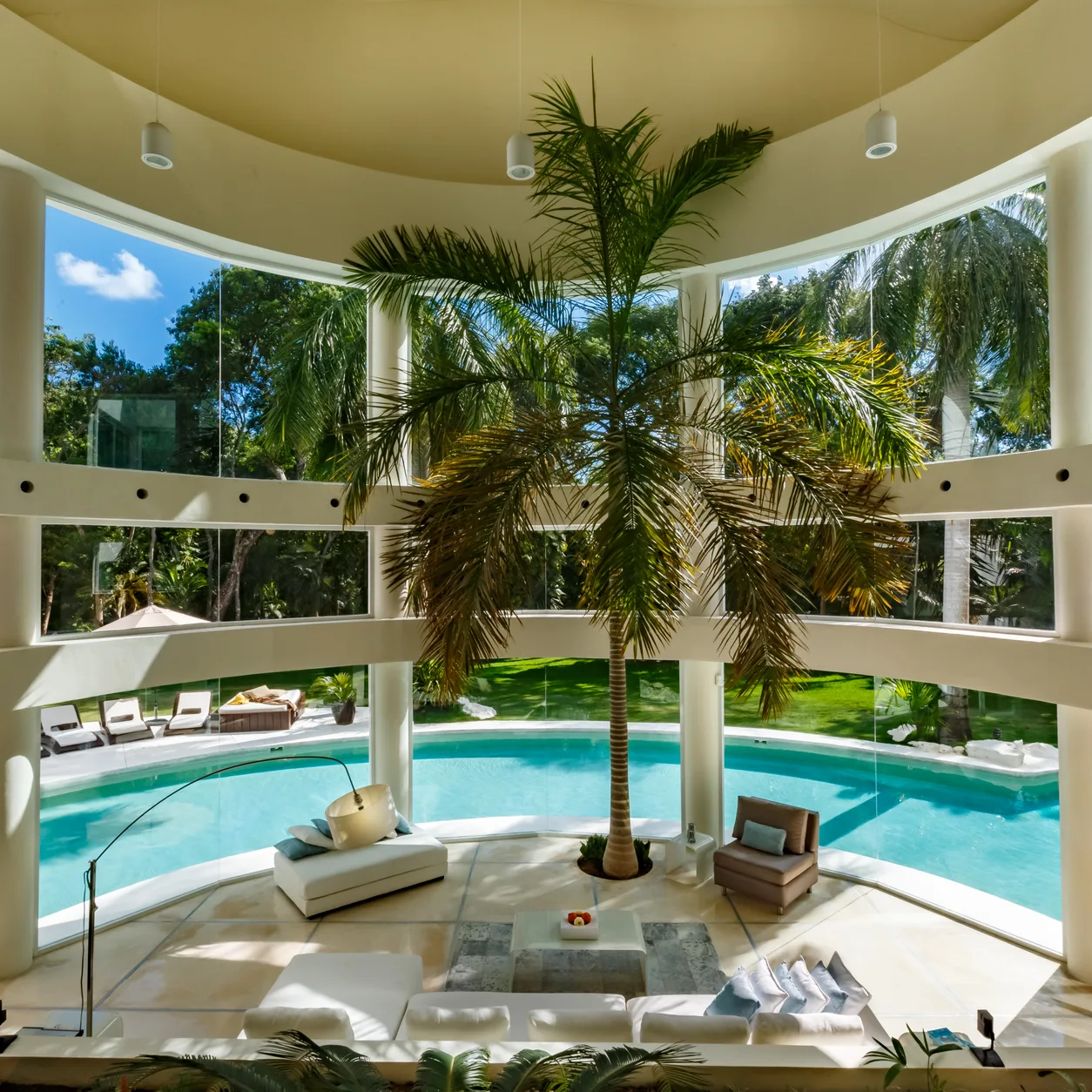 Villa Aqua's bright, elegantly furnished living room with an ocean view in Playa del Carmen